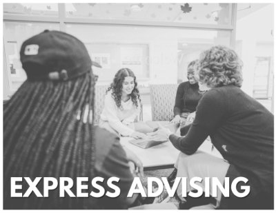 Students sit with an advisor